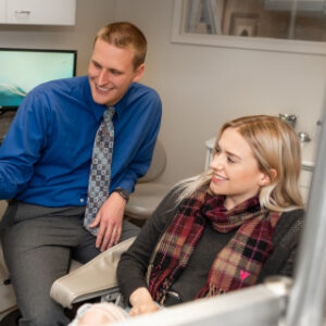 aberdeen dentist works with his patient for implant